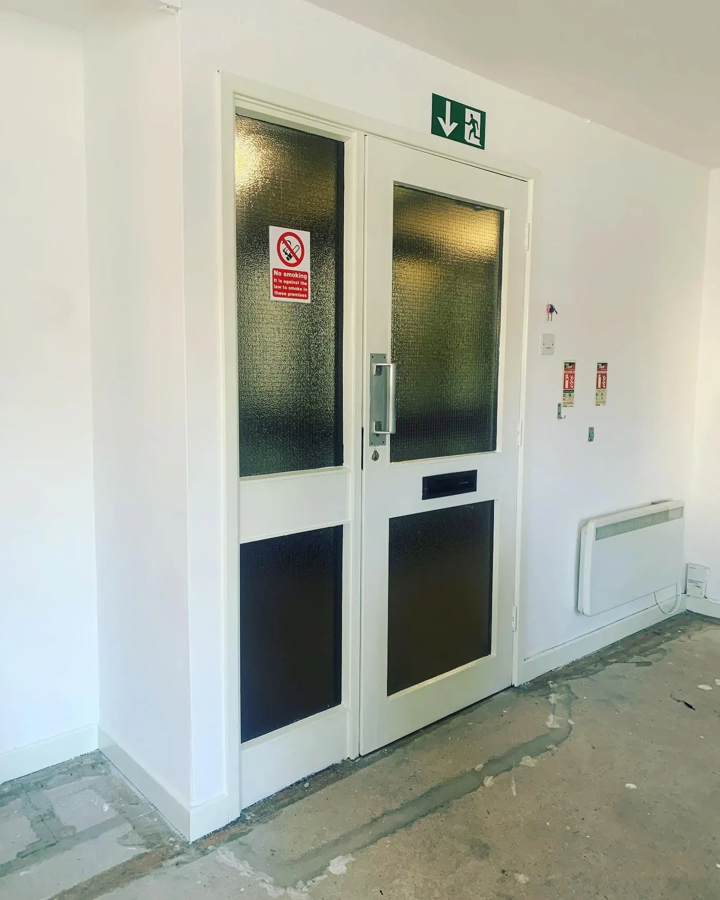 Commercial interior with dark-framed doors