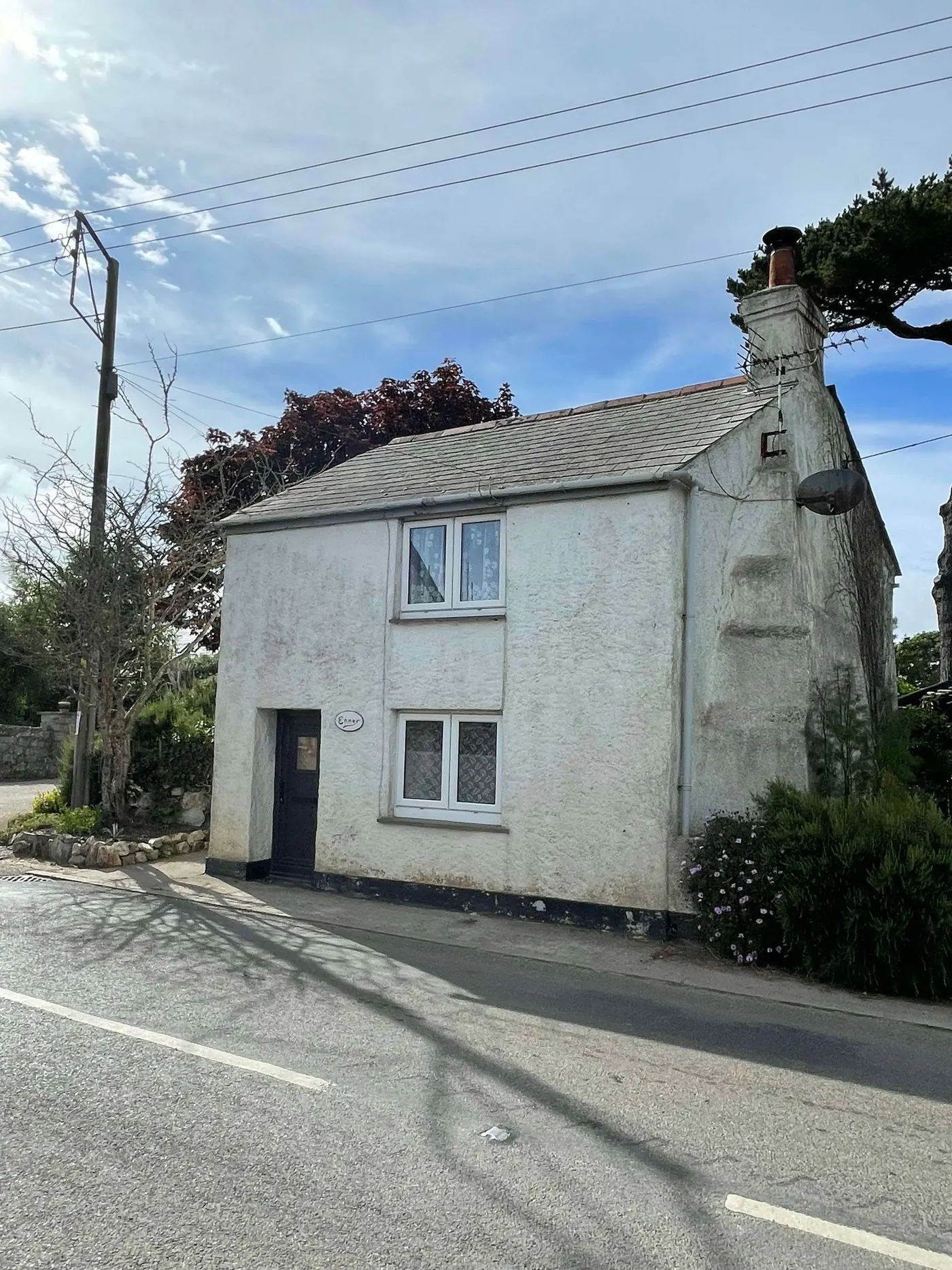 Ennor Cottage, a traditional Cornish cottage repainted white