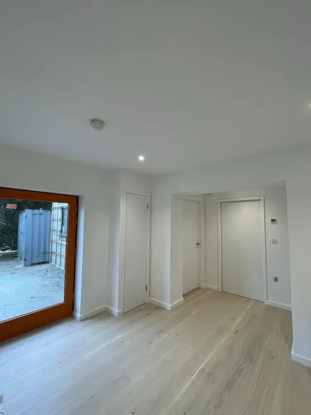 Freshly decorated hallway with oak floor