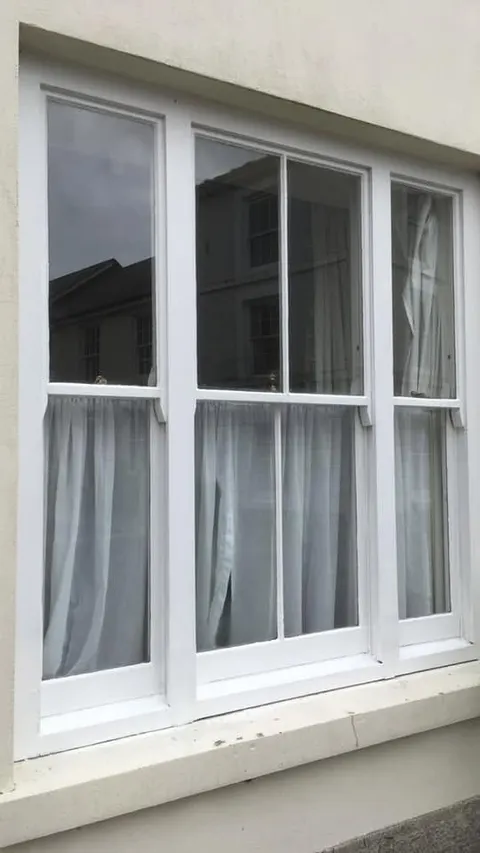 Repainted white sash windows